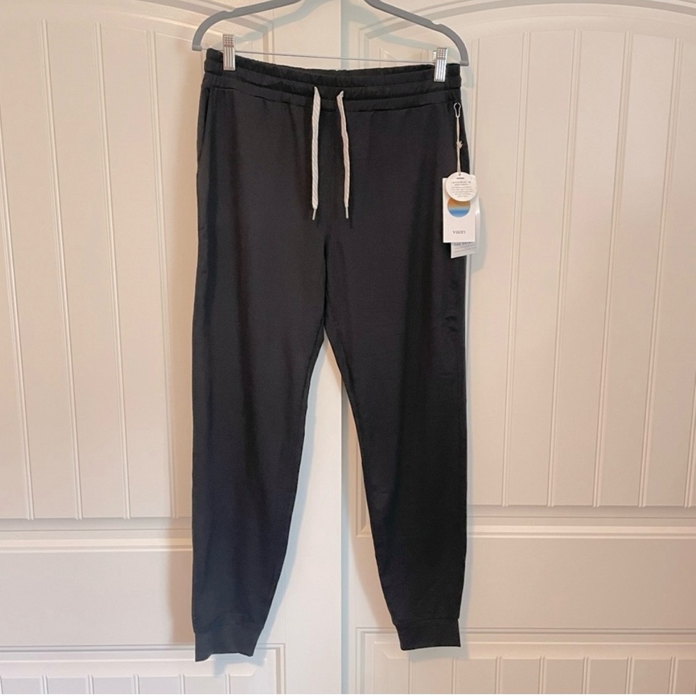 NWT Vuori performance joggers black 
new with tags 
size medium - long